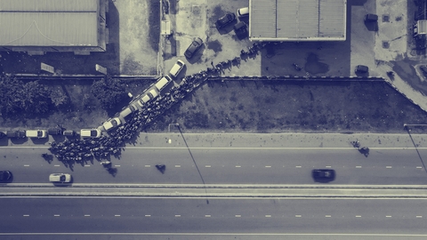 people waiting in line for gas
