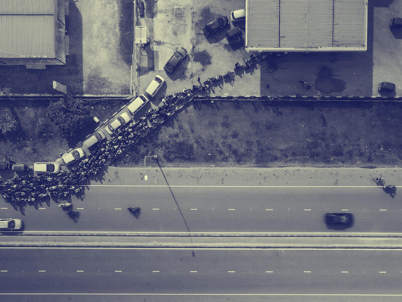 people waiting in line for gas