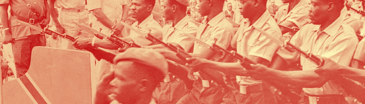 roops march before President Julius Nyerere and Vice President Abeid Karume at the fourth anniversary of the union of Zanzibar and Tanganyika in January 1968